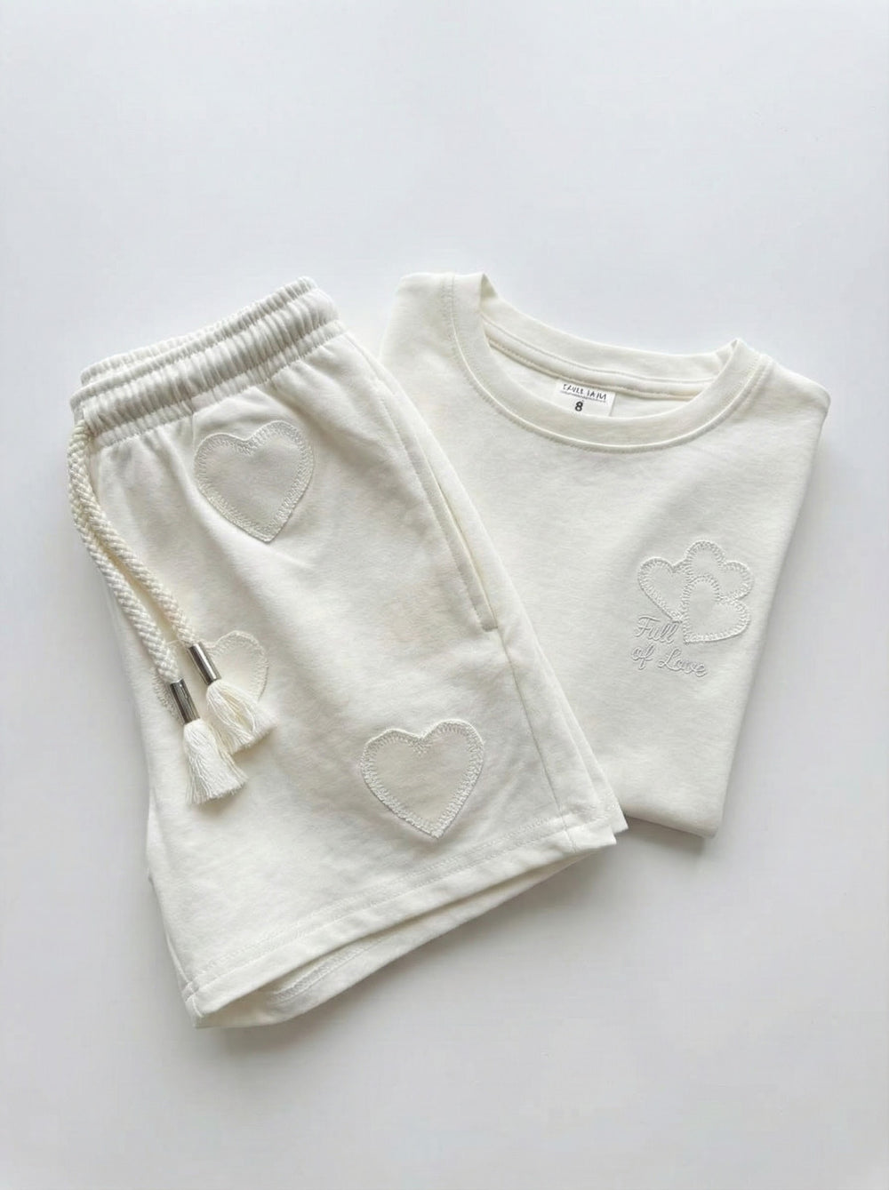 חליפה לילדות מבד כותנה דגם טקסטורת לבבות